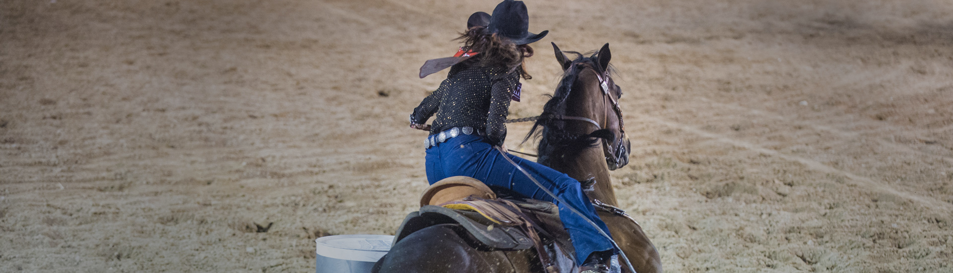 Rodeo Girl Riding a Horse